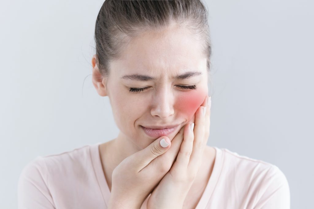 Zahnarzt Itzehoe - Frau mit Zahnschmerzen